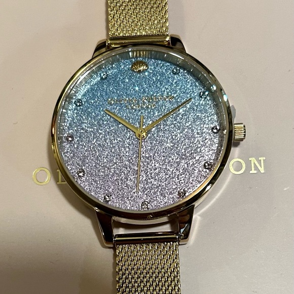 Olivia Burton Watch With 34mm Glitter Face With Golden MeshBracelet.